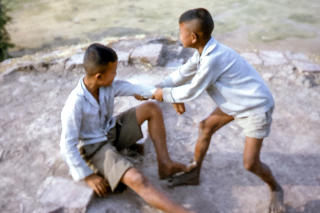 Kids at play, Phimai, Thailand